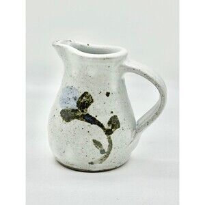 Small handcrafted Stoneware Pottery Pitcher, a creamer or small milk jug.